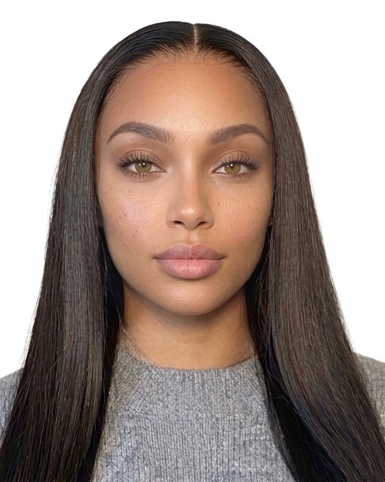 Model wearing a long straight 13x4 lace frontal wig, front view