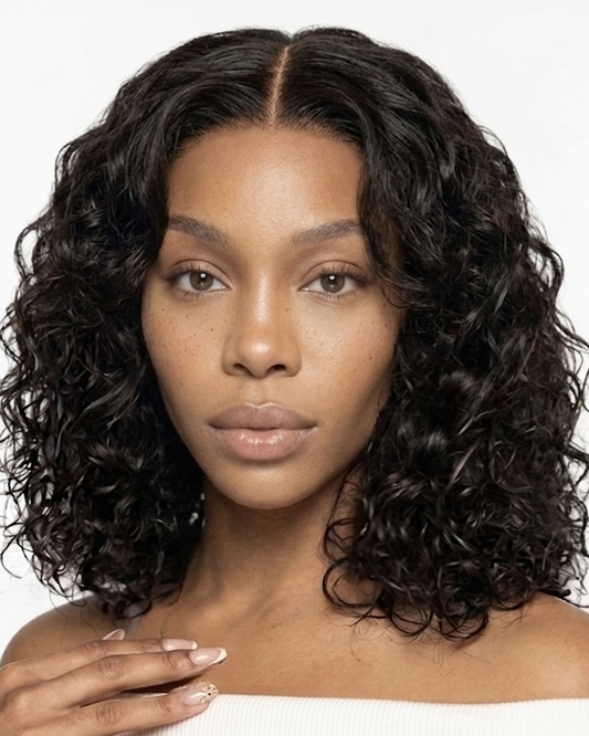 Model wearing a 14 inch curly bob wig, front view